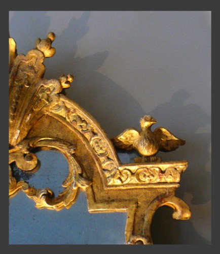 Miroirs, Trumeaux  - Miroir en bois sculpté et doré d'époque Régence