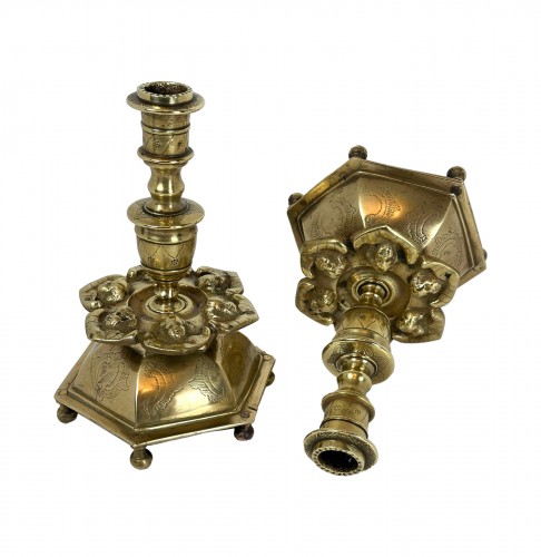 A Holy Roman Empire pair of bronze candlesticks, early 17th century
