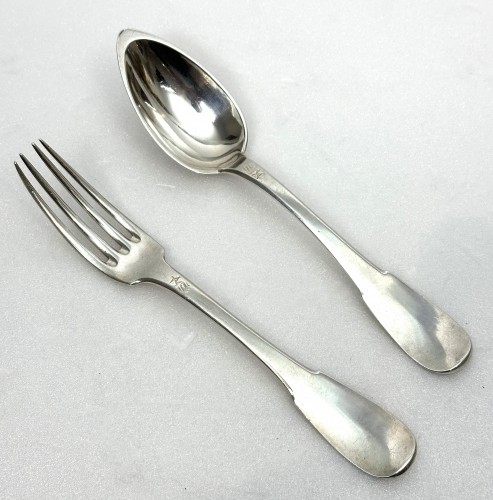 a Louis XVIII solid silver flatware sets  of twelve - Restauration - Charles X