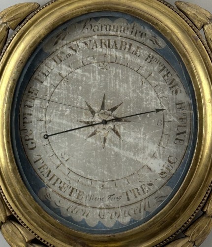 A Louis XVI giltwood barometer with scientific attributes - Louis XVI