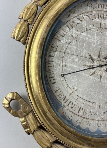Louis XVI - A Louis XVI giltwood barometer with scientific attributes