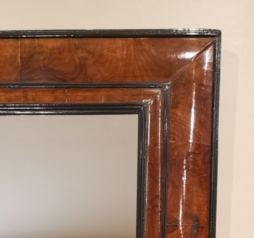 17th century - A Louis XIV walnut cushion-framed mirror  late 17th century, circa 1680.