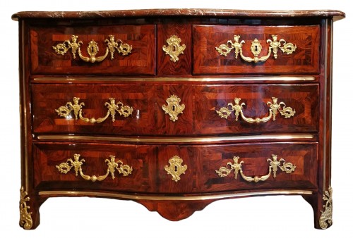 A Régence ormolu-mounted rosewood commode early 18th century, circa 1720.