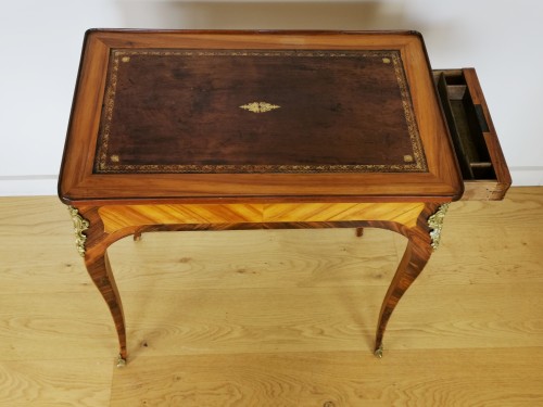 Antiquités - A Louis XV marquetry table, known as &quot;à billets doux&quot; 18th century.