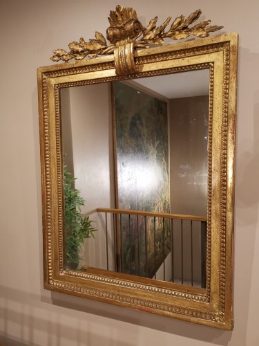 A giltwood mirror irca 1780 - Mirrors, Trumeau Style Louis XVI