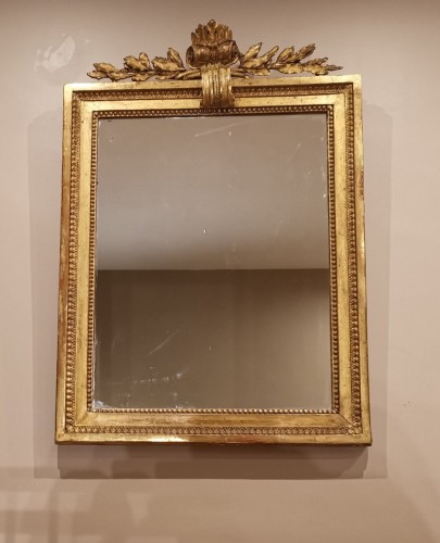 Mirrors, Trumeau  - A giltwood mirror irca 1780