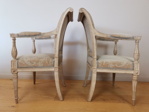 Seating  - Pair of flat-backed armchairs, rolled Louis XVI stamped Roussens