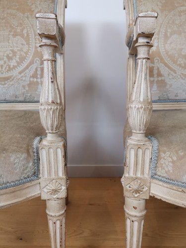 18th century - Pair of flat-backed armchairs, rolled Louis XVI stamped Roussens