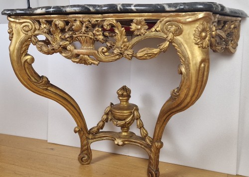 Furniture  -  A Louis XV giltwood console, circa 1760
