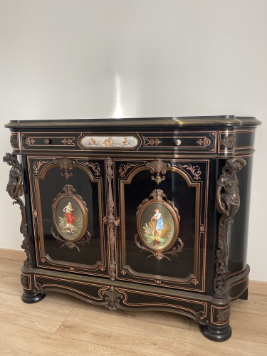 Antiquités - A late 19th century Cabinet with And porcelain panels