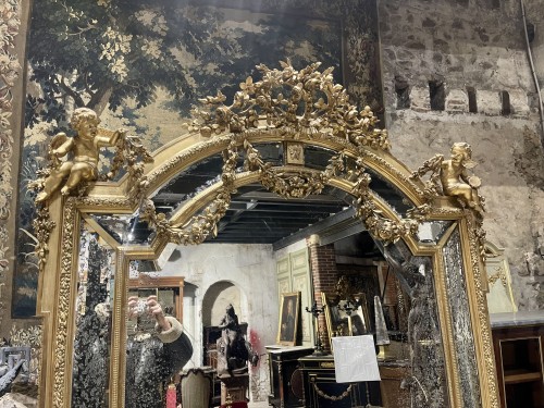 Miroirs, Trumeaux  - Miroir Napoléon III en bois doré aux angelots musiciens