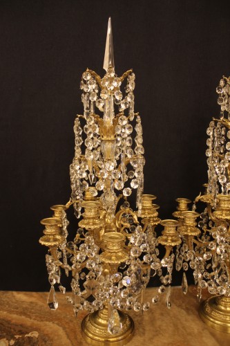 Luminaires Bougeoirs et Chandeliers - Paire de girandoles à 9 feux en bronze et cristal, époque Napoléon III
