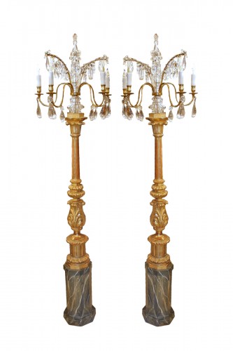 Pair of painted and gilded carved wood torchères, late 19th century