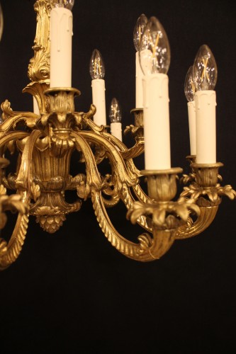 Antiquités - Lustre en bronze doré à 18 feux, époque Napoléon III