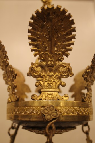 Antiquités - Lustre d'époque empire à neuf feux en bronze doré et laqué