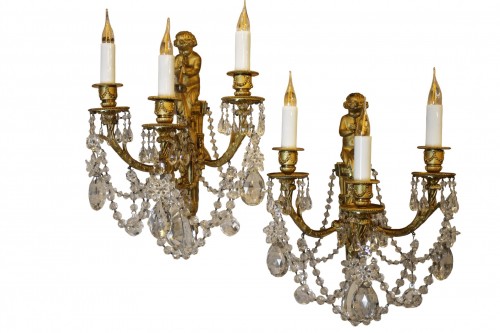 Paire d'appliques au satyre à la trompette en bronze et cristal, époque Napoléon III