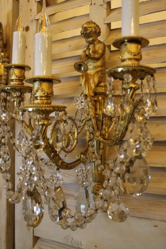 Napoléon III - Paire d'appliques au satyre à la trompette en bronze et cristal, époque Napoléon III