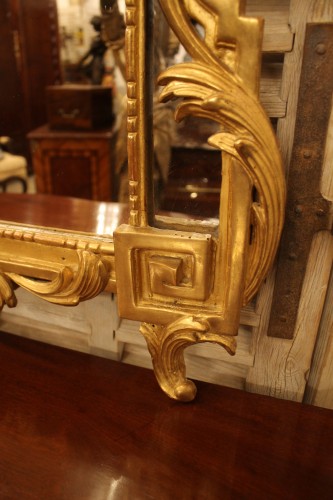 Miroirs, Trumeaux  - Miroir en bois doré d'époque Transition