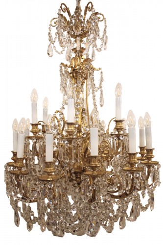 Important lustre en bronze doré et cristal de Baccarat à 18 feux, époque Napoléon III