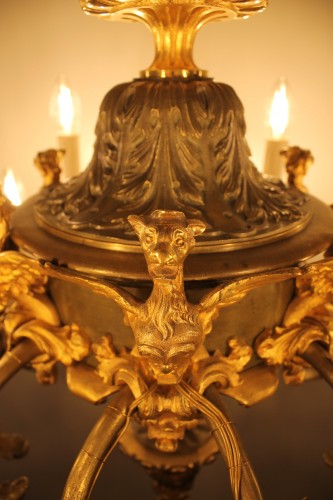 Antiquités - Lustre en bronze doré et patiné à 18 feux, époque Napoléon III