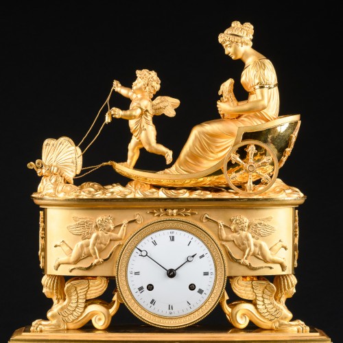 Pendule Empire, Eros et Psyché sur un char tiré par des papillons - Horlogerie Style Empire