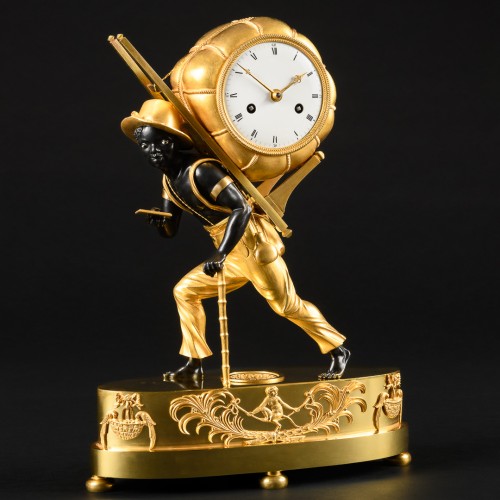 Empire Clock &quot;Le Portefaix&quot; After Design By Jean-André Reiche  - 
