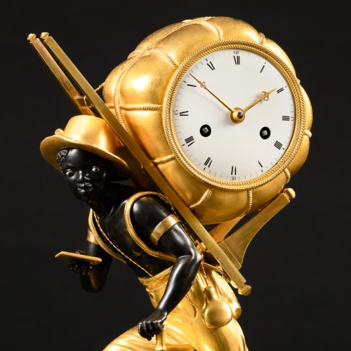 Empire Clock &quot;Le Portefaix&quot; After Design By Jean-André Reiche  - Empire