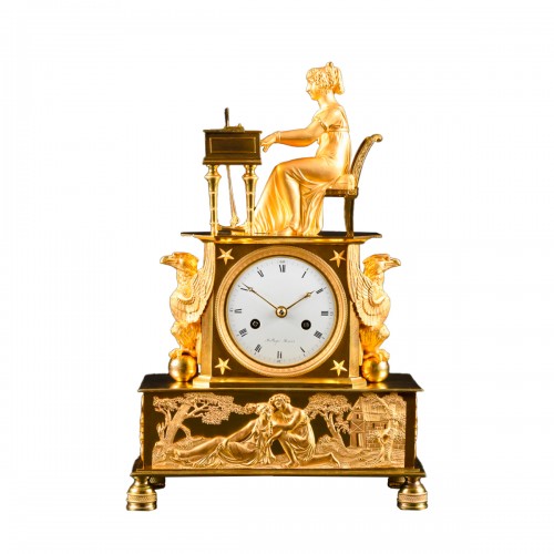Pendule de cheminée Empire en bronze doré “L’épinettiste”