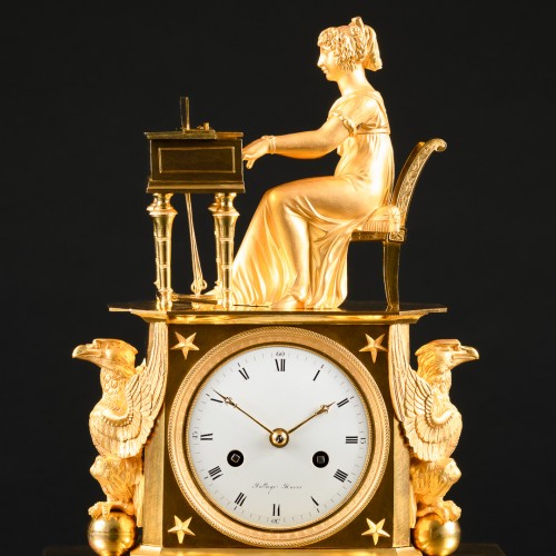 Pendule de cheminée Empire en bronze doré “L’épinettiste” - Horlogerie Style Empire