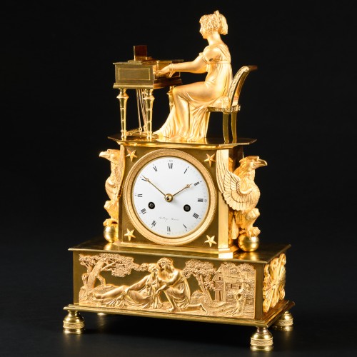 Empire gilt bronze mantel clock “L’épinettiste” - Empire