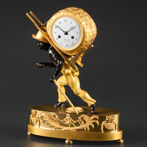 Antiquités - Empire Clock Le Portefaix After Design By Jean-André Reiche
