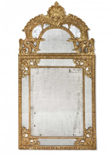 Regence period gilded wood mirror with parecloses