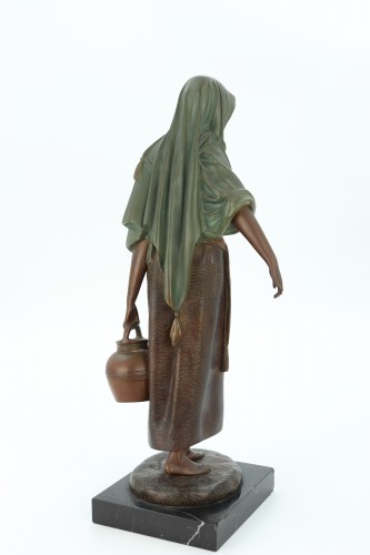 The water carrier by Demetre Chiparus - 