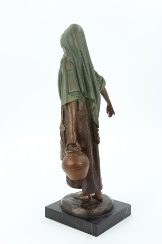 20th century - The water carrier by Demetre Chiparus