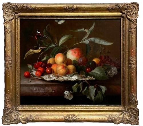 Still-life with fruits on a silver platter, surrounded by butterflies 
