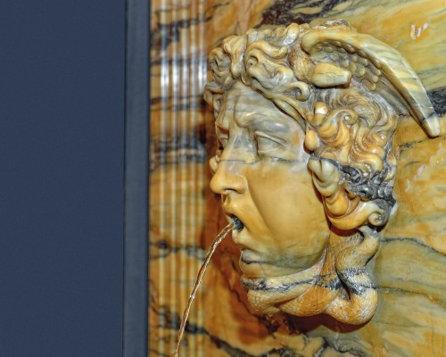 An important 19th century yellow Siena marble Wall Fontain - 