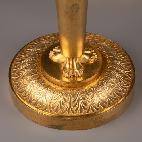 Lighting  - Pair of candlestick in finely chased bronze gilded with mercury.