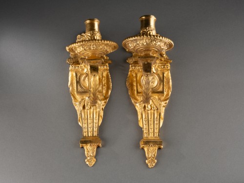 Antiquités - Series of four bronze sconces, Paris Regency period