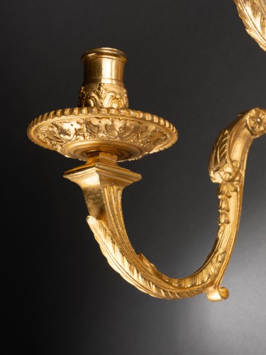 Antiquités - Series of four bronze sconces, Paris Regency period