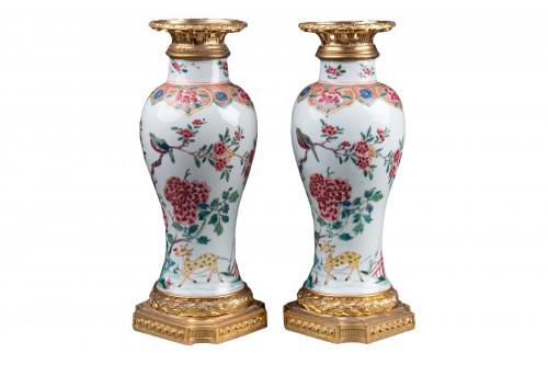 Pair of Chinese porcelain and gilded bronze vases