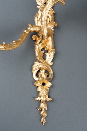 Pair of gilded bronze sconces, Paris around 1730 - French Regence