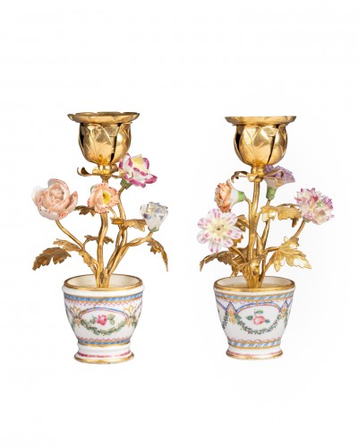 Pair of Sèvres porcelain egg cups mounted as candlesticks