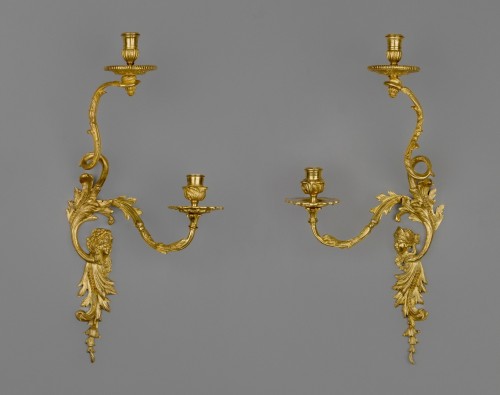 Pair of sconces with cherubs, Paris circa 1720 - 