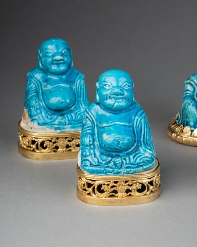 Collection of eight turquoise-glazed biscuit porcelain figures of Budai, Ch - Porcelain & Faience Style Louis XIV