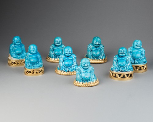 Collection of eight turquoise-glazed biscuit porcelain figures of Budai, Ch - 