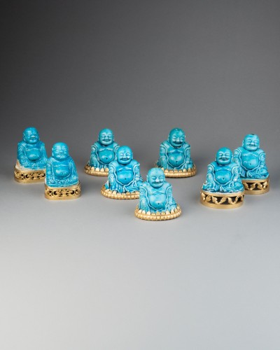 18th century - Collection of eight turquoise-glazed biscuit porcelain figures of Budai, Ch