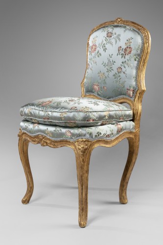 Seating  - A Louis XV pair of giltwood chairs