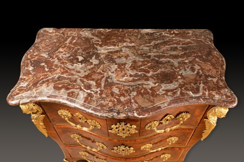 French Regence - A Regence ormolu-mounted kingwood commode, stamped A. Criaerd