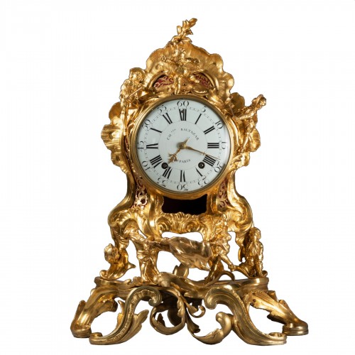 An important Louis XV gilt bronze clock "Commedia dell'arte" 