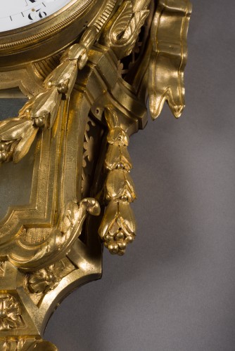 Horology  - Gilt Bronze Wall Cartel “à ruban”, model Robert Osmond – Paris, 18th C.